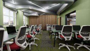 Modern commercial office workspace — laptops, ergonomic seating, feature wood-slat wall